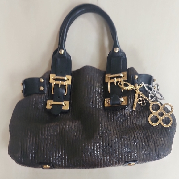 Louis Vuitton Motard Bike bag year 2007 Elegant Black Handbag with Gold Accents - Picture 2 of 10